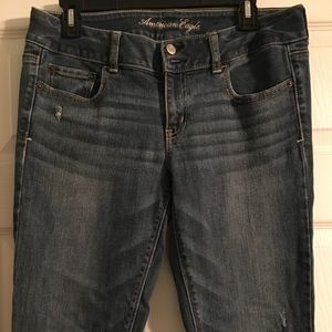 American Eagle rinse worn in boot cut jeans 8